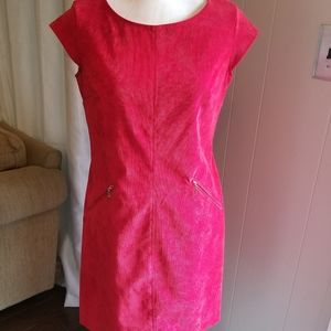 Deep red courdaroy dress with zippered pockets